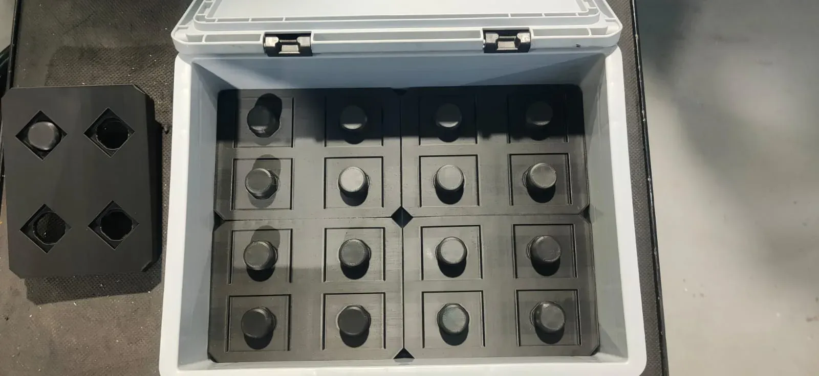 Custom-printed tray holding finished machined components